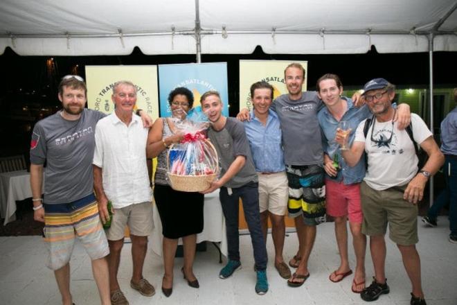 Crew of Challenger, Whitbread 60 receives a gift basket at the prizegiving - RORC Transatlantic Race © RORC/Arthur Daniel
